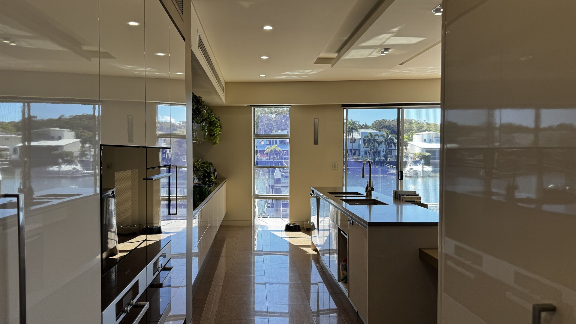 A waterfront kitchen and living space cleaned by Care for a Clean