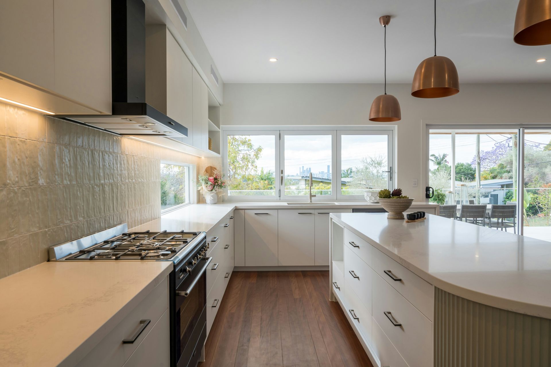 Care For A Clean team cleaning a Gold Coast kitchen